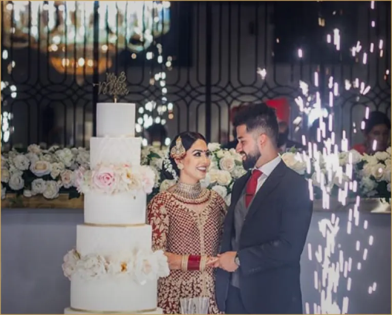 Couple with wedding cake